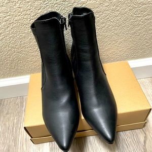 Women’s black boots. Brand new, never worn.